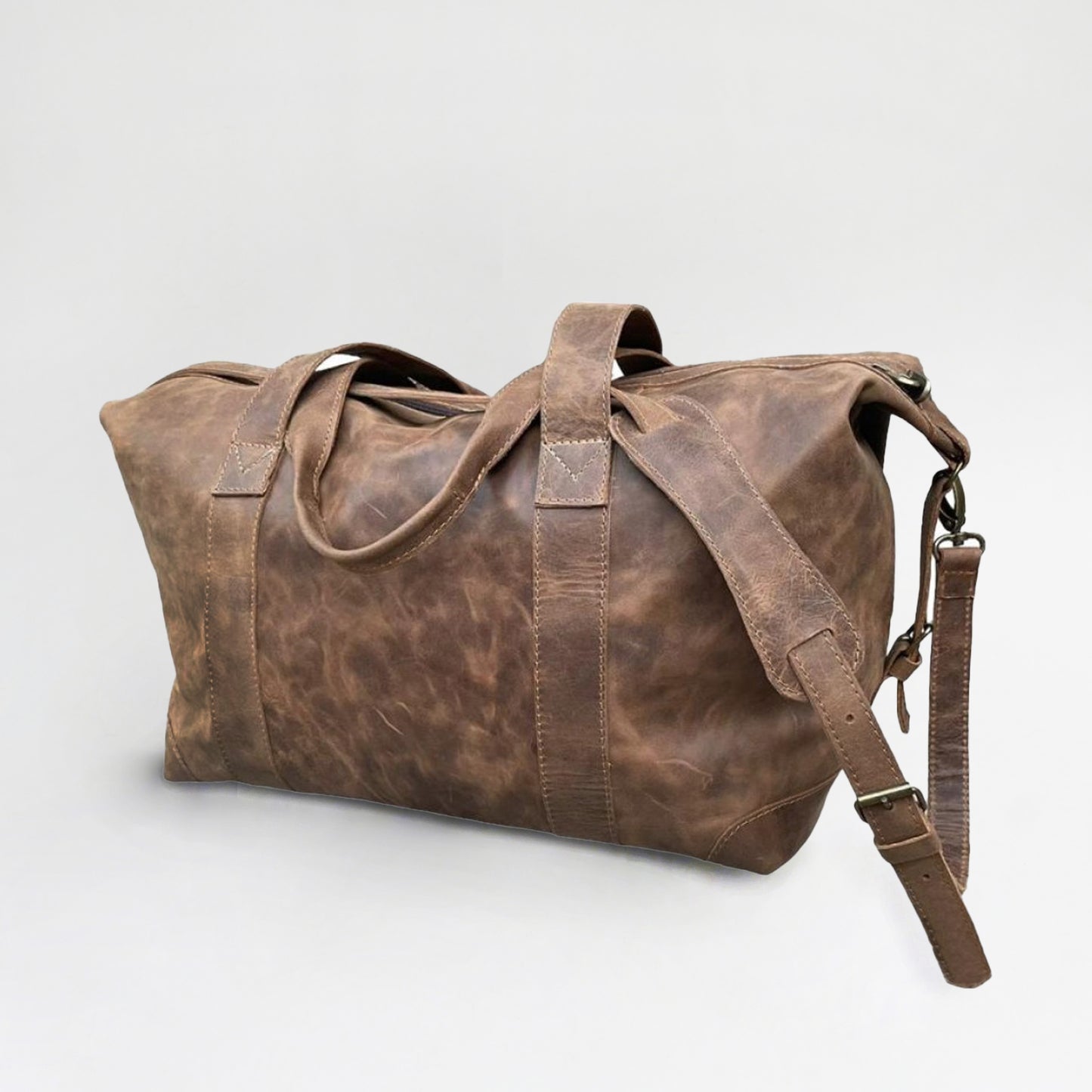 Bolso en cuero natural, doble manilla y doble carro. 50x30x25 cm. Ideal para viaje de fin de semana. Regalo corporativo premium.