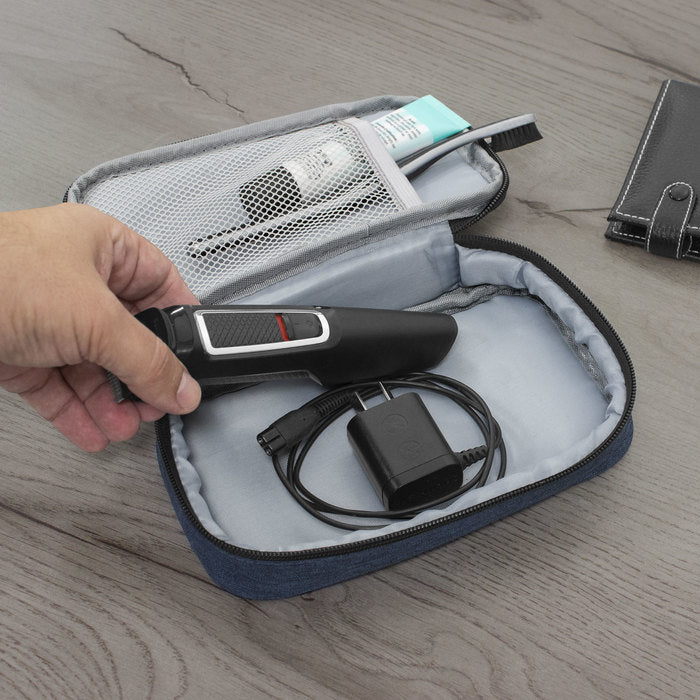 Neceser de poliéster 300D acolchado con interior forrado, bolsillo de red y opción de personalizar con logo. Un regalo corporativo práctico, resistente y funcional.