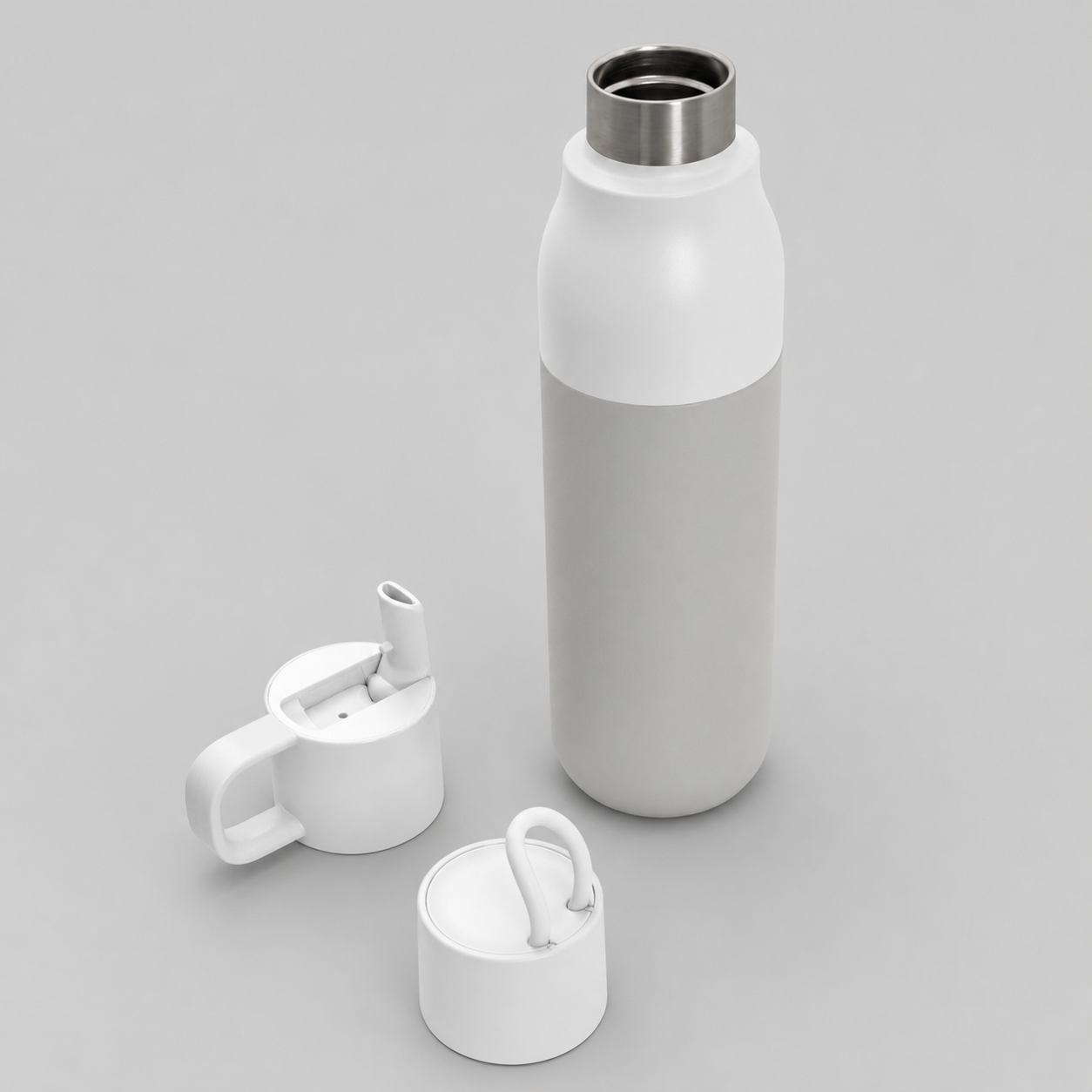 Set de botella térmica de 500 ml con doble pared de acero inoxidable y dos tapas intercambiables. Mantiene bebidas calientes hasta 8 horas y frías hasta 12 horas. Ideal como regalo corporativo.