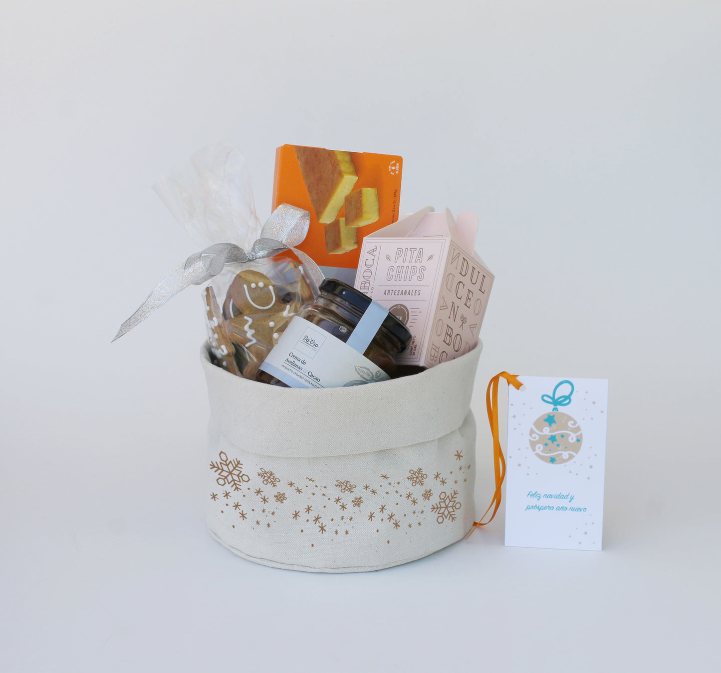 “Regalo Dulce Navidad con panera de algodón, turrón y galletas navideñas – Aporta Imagen Chile”