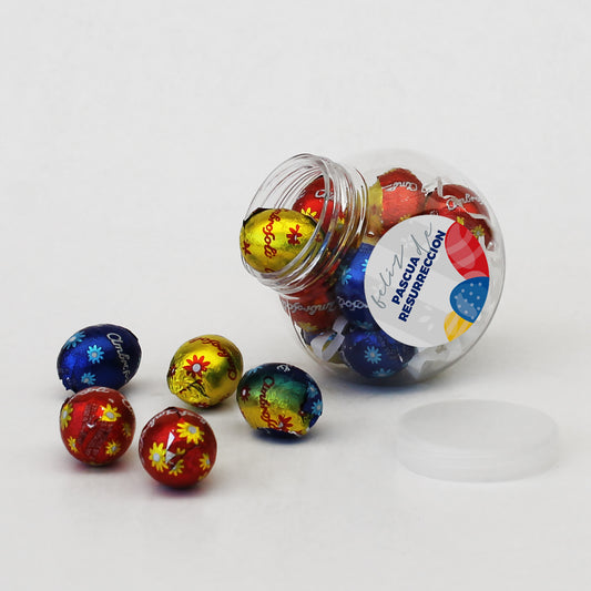 Sorprende con este regalo Refugio de Esperanza. Frasco mate con tapa frozen, 10 huevitos Ambrosoli y sticker personalizado con tu logo. El regalo de Pascua moderno y reutilizable para tu empresa. ¡Cotiza en Aporta Imagen!