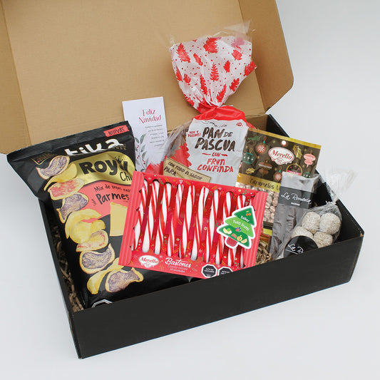 Regalo “Alegría y Tradición” con pan de pascua y dulces. Un clásico navideño que celebra la calidez y el sabor de estas fiestas.