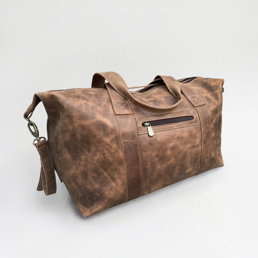 Bolso en cuero natural, doble manilla y doble carro. 50x30x25 cm. Ideal para viaje de fin de semana. Regalo corporativo premium.
