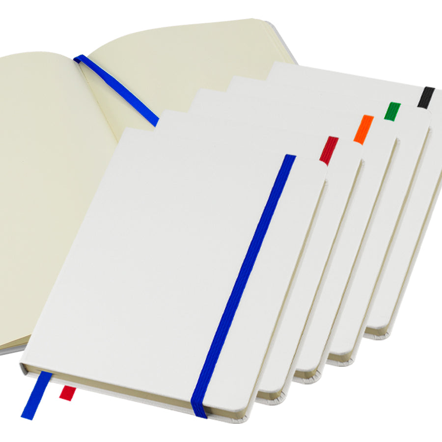 Cuaderno A5 modelo Whiteskine con tapa forrada, 80 hojas amarillas lisas, banda elástica y cinta separadora. Disponible en varios colores y personalizable con logo.