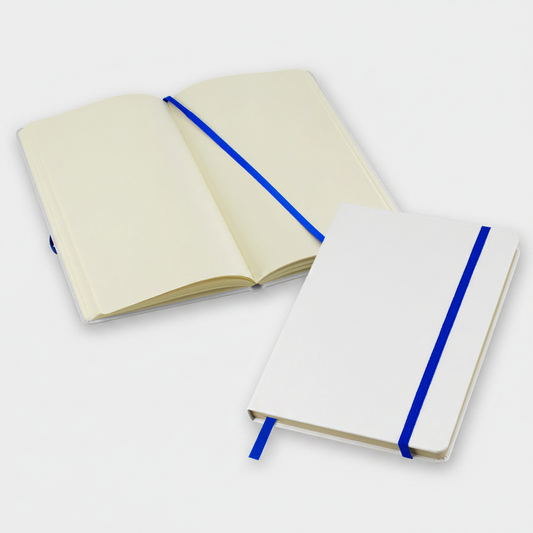 Cuaderno A5 modelo Whiteskine con tapa forrada, 80 hojas amarillas lisas, banda elástica y cinta separadora. Disponible en varios colores y personalizable con logo.