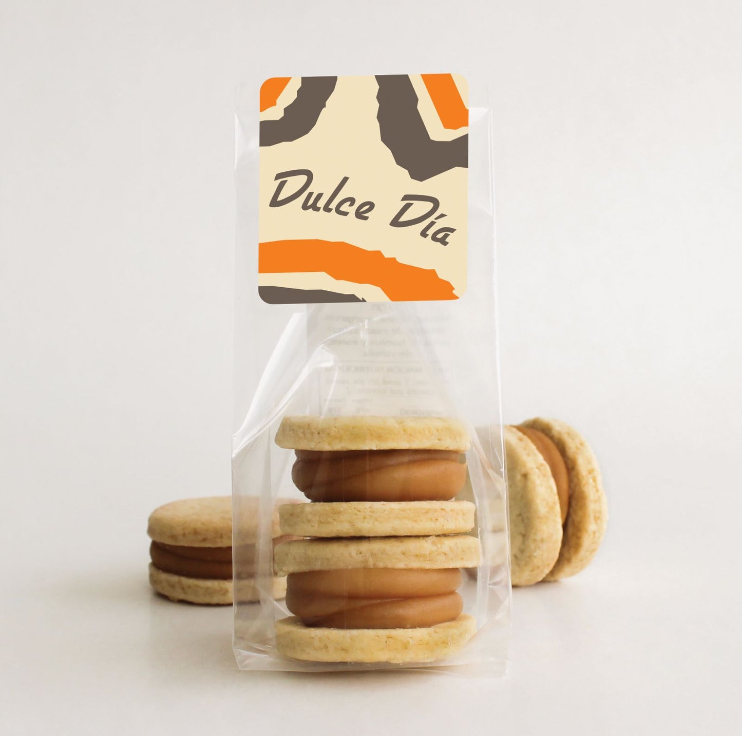 Bolsita con 2 mini alfajores Mi Otra Pasión, sticker con mensaje y logo corporativo. Detalle dulce ideal para eventos.