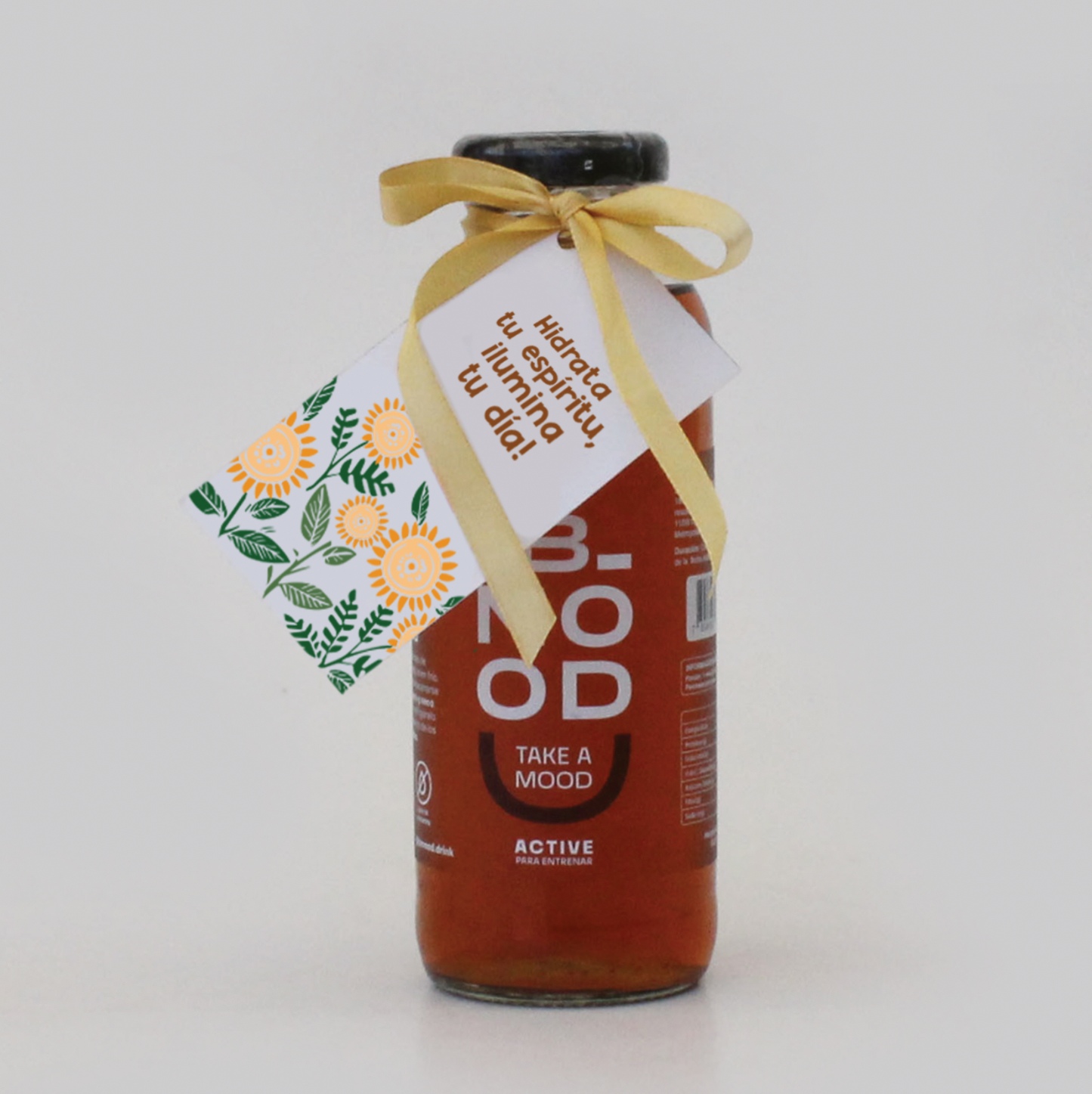 Un detalle corporativo original: Bebida funcional Bmood para el Día de la Mujer. Incluye cinta de regalo y tarjeta con diseño alusivo. Sorprende a tu equipo con bienestar y distinción.