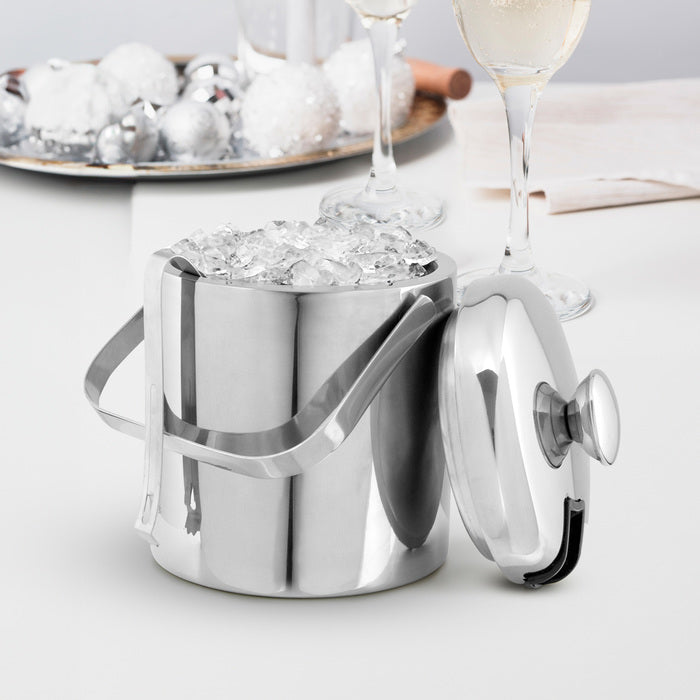Hielera de acero inoxidable 1100 ml con pinza para hielo. Presentada en caja kraft y bolsa de papel con tarjeta personalizada con logo corporativo. Mínimo 50 unidades.