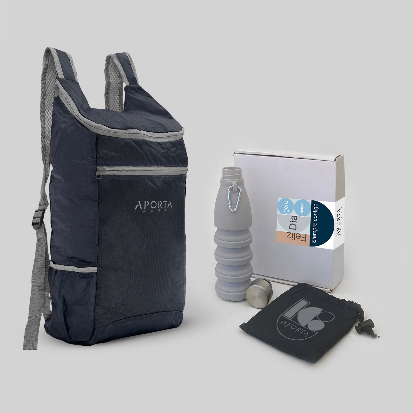 Kit sustentable con mochila 13L y botella 500ml plegables en caja kraft con tarjeta personalizada. El regalo corporativo ideal para el Día del Trabajador. ¡Cotiza hoy!
