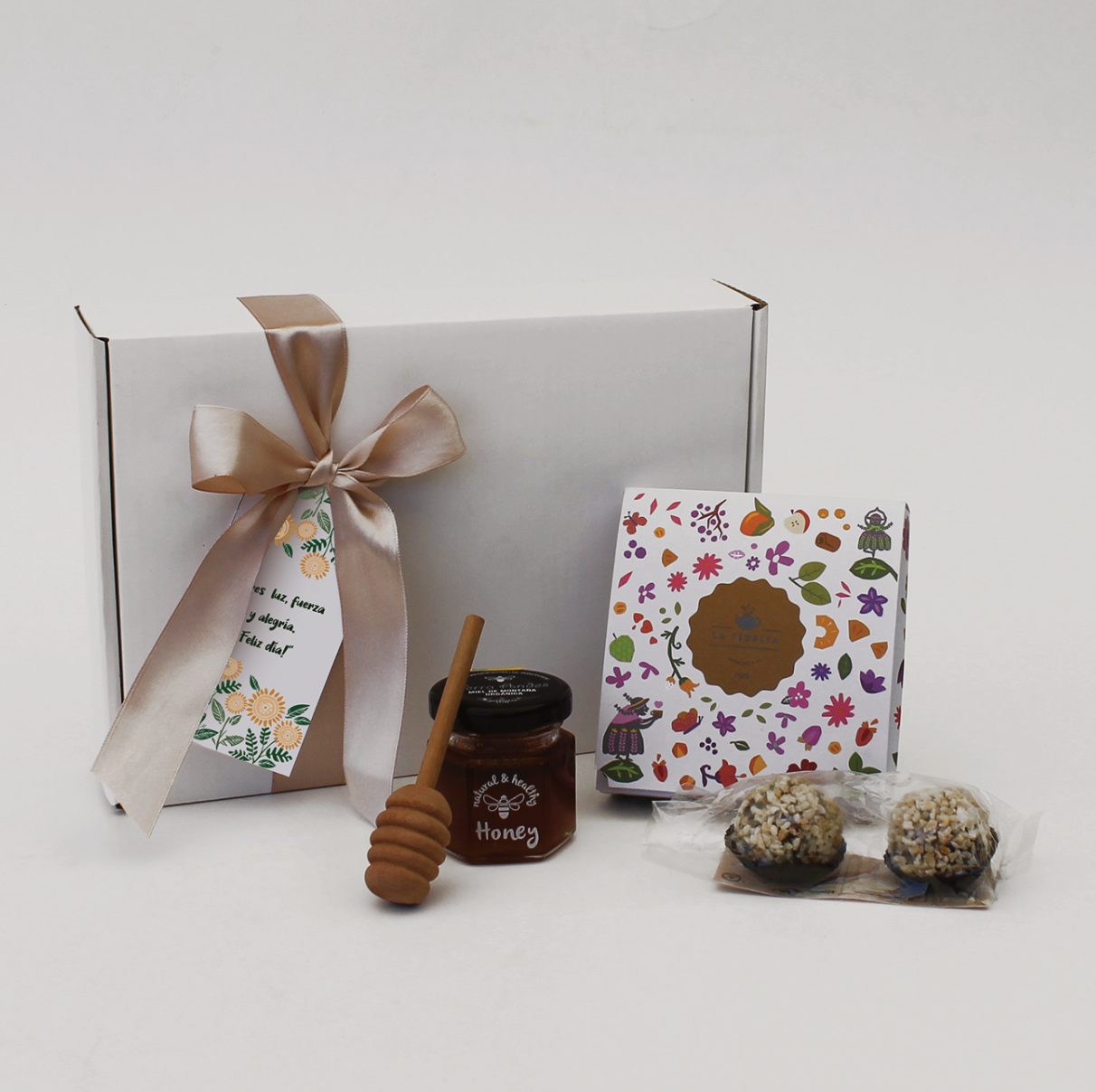 Sorprende a tus colaboradoras con un pack gourmet saludable. Incluye miel Terra Andes, trufas D'aoro y té en pirámide. Presentación en caja kraft con logo corporativo. El detalle más distinguido de Aporta Imagen. ¡Compra aquí!"
