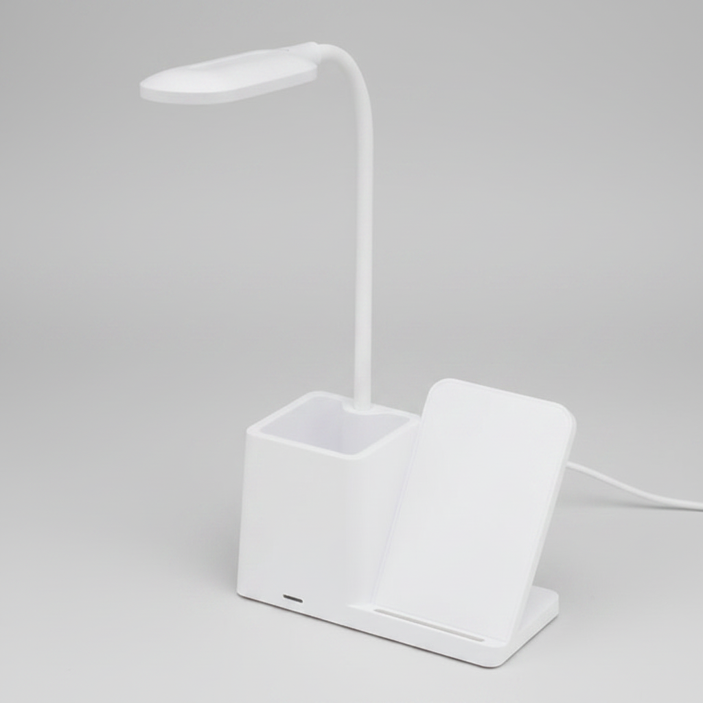 Lámpara de escritorio LED con cargador inalámbrico de 15W, portabolígrafos integrado, cuello flexible y 3 modos de luz. Compatible con tecnología Qi. Personalizable con logo para empresas y regalos corporativos.
