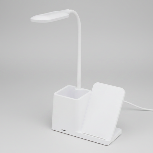 Lámpara de escritorio LED con cargador inalámbrico de 15W, portabolígrafos integrado, cuello flexible y 3 modos de luz. Compatible con tecnología Qi. Personalizable con logo para empresas y regalos corporativos.