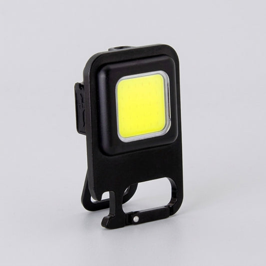 Linterna LED recargable con 3 intensidades, imán, destapador y mosquetón. Carga USB-C. El regalo corporativo táctico ideal para el Día del Trabajador. ¡Cotiza!