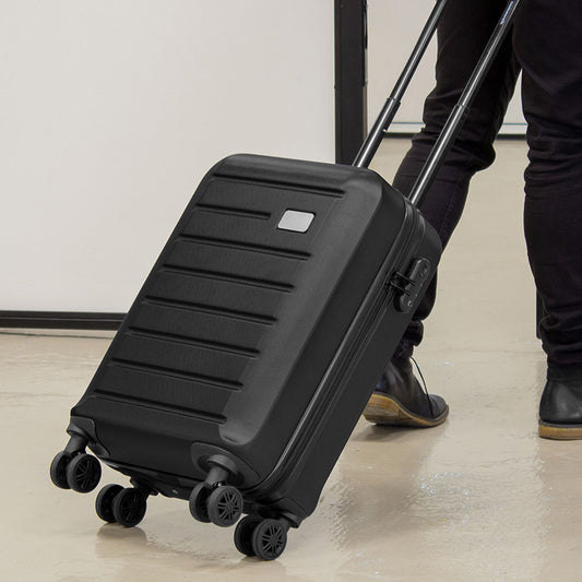 Maleta de viaje fabricada en ABS con capacidad de 38 litros, doble compartimento y candado de combinación. Un regalo corporativo práctico, elegante y pensado para acompañar cada viaje.
