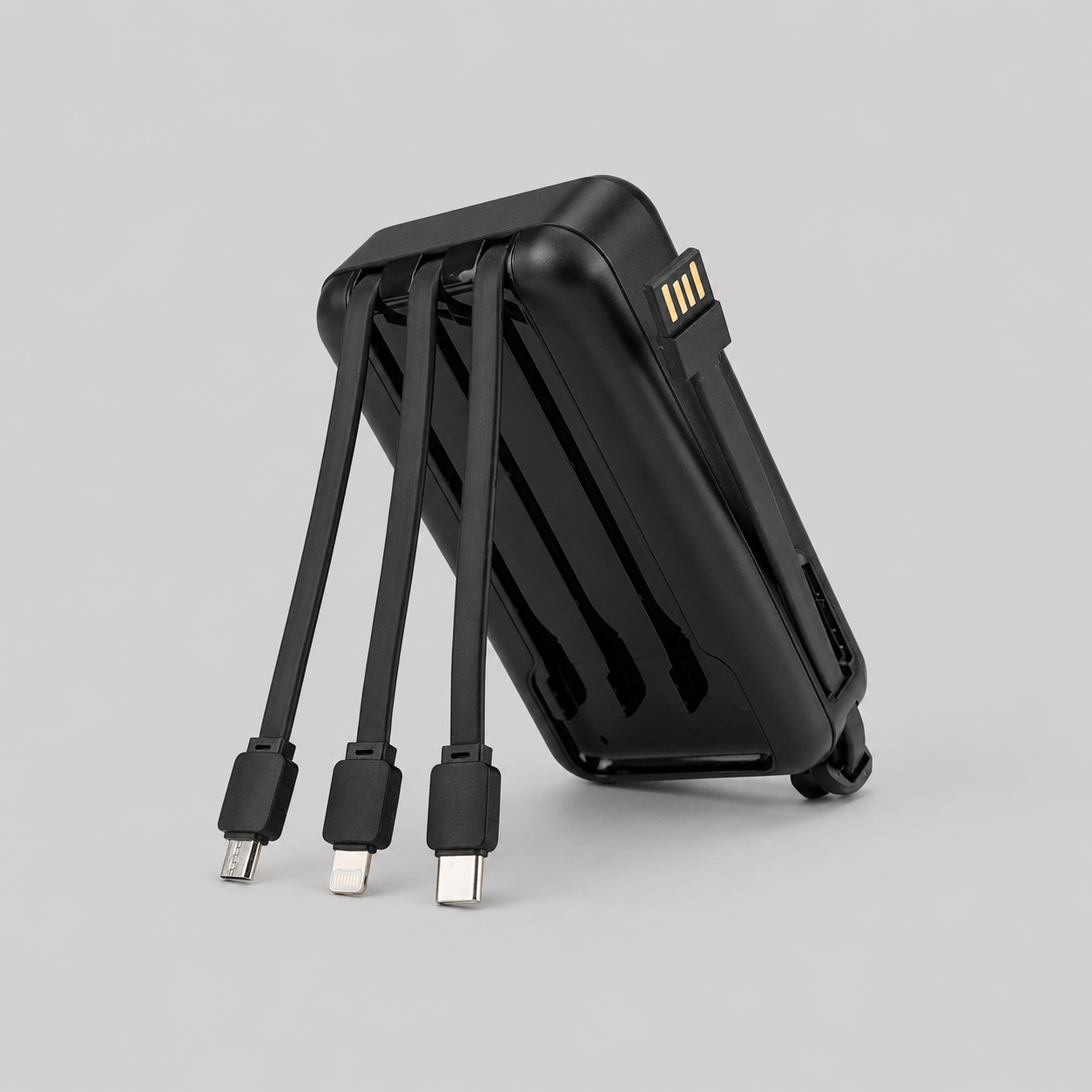 Power Bank Deluxe de 20.000 mAh con pantalla digital, cables integrados para Micro USB, Tipo C y iPhone. Un regalo corporativo tecnológico, práctico y personalizable con logo.