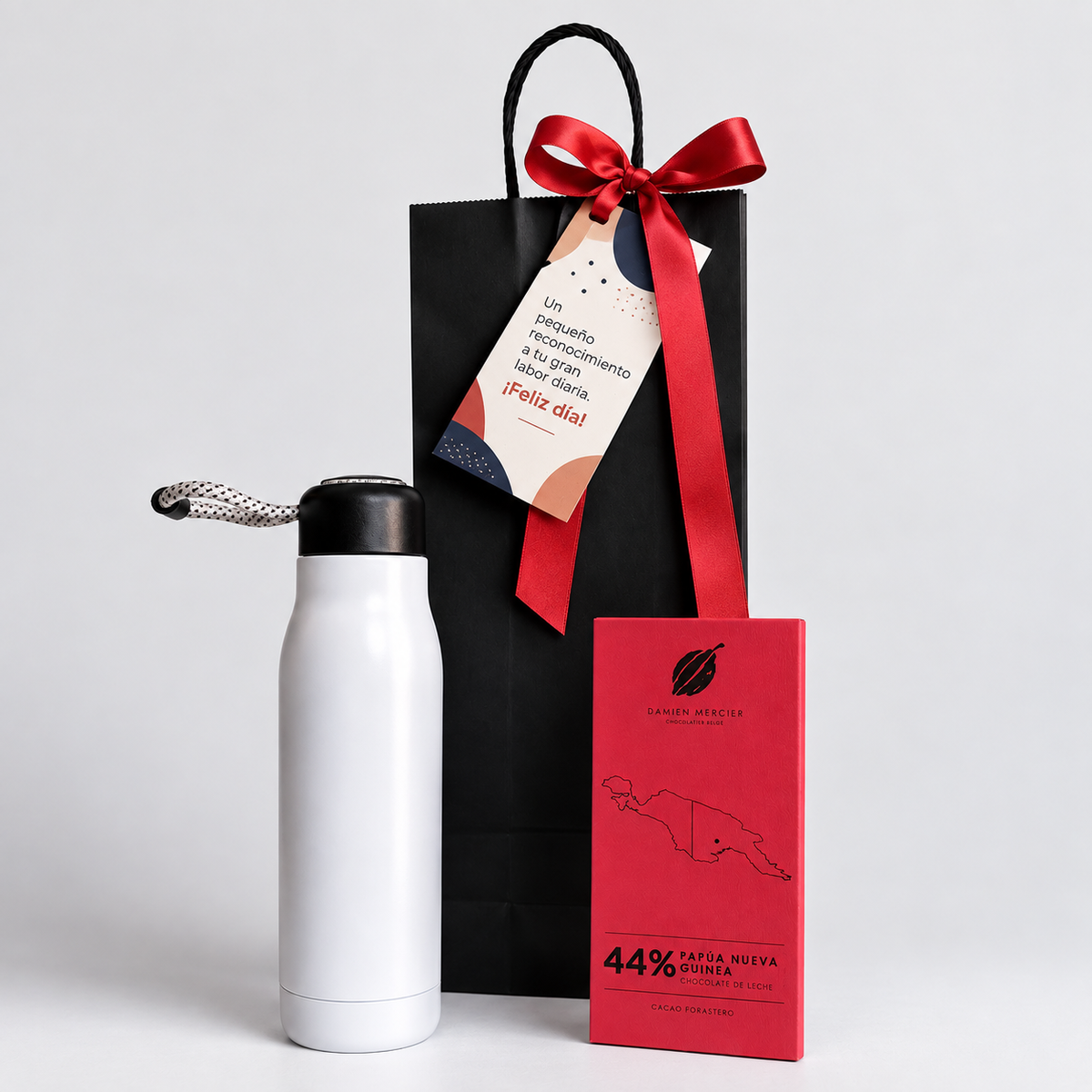Sorprende y reconoce a tu equipo con un regalo corporativo útil y delicioso: botella térmica y chocolate Damien Mercier. ¡Personalízalo con tu logo y cotiza hoy!