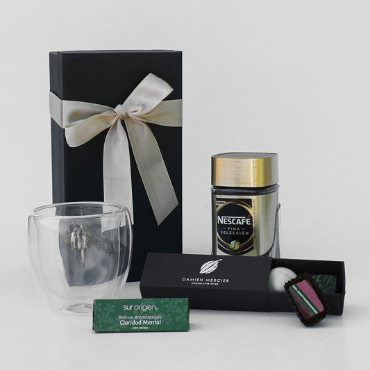Regalo corporativo para bienestar y energía. Incluye vaso térmico, café premium, bombones y roll on de aromaterapia. Ideal para renovar cuerpo y mente.