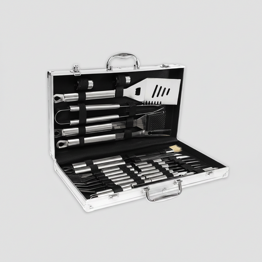 Set de asado premium con 24 herramientas de acero inoxidable en elegante caja metálica. Incluye presentación corporativa y opción de logo grabado.