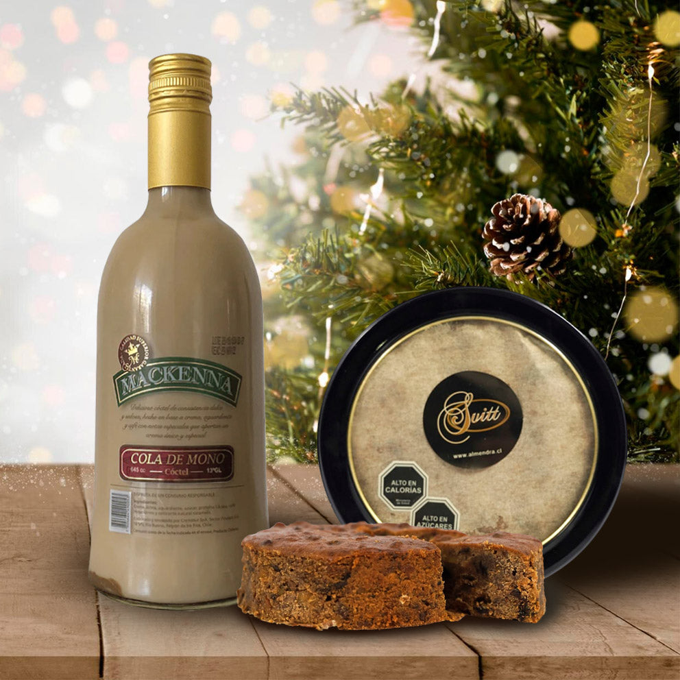 Set navideño con Cola de Mono artesanal Mackenna Premium y Pan de Pascua Big Dan Suitt en envase metálico. Un regalo corporativo ideal para celebrar y compartir.