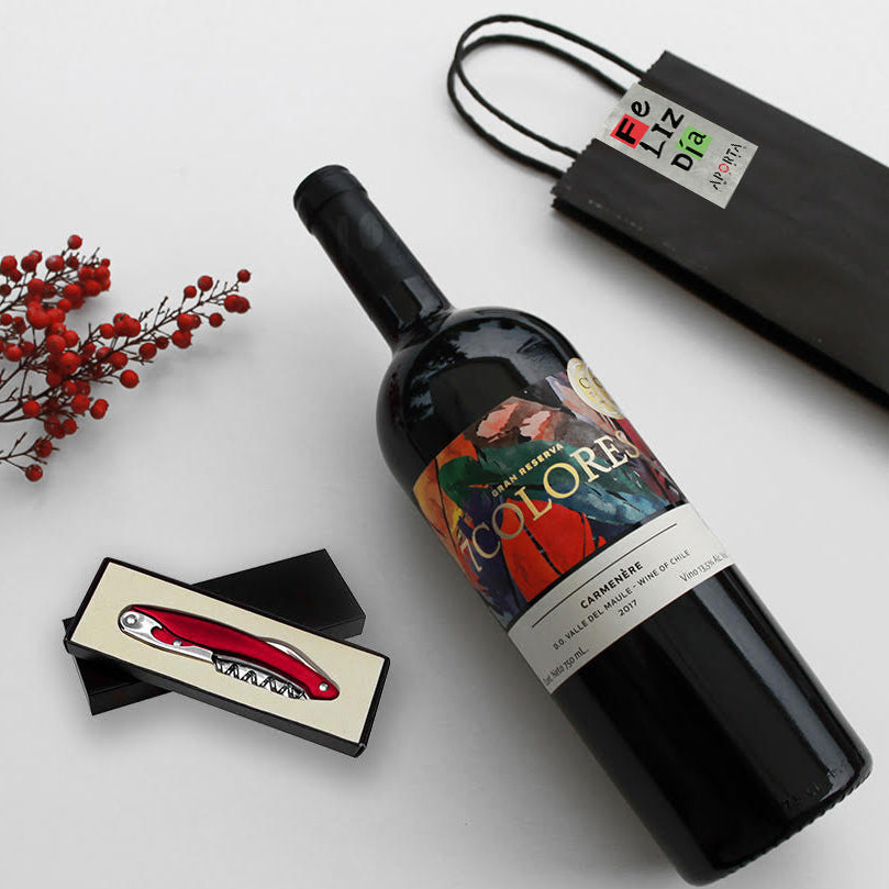 Vino 7 Colores Gran Reserva 750cc con sacacorchos de acero, abrebotellas y cuchillo. Presentación en bolsa de papel. Personalizable. Pedido mínimo 50 unidades.